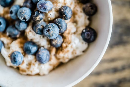 bowl of oatmeal topped with berries